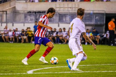 Doğu RUTHERFORD, NJ - 26 Temmuz 2019: Atletico de Madrid 'den Joao Felix MetLife Stadyumu' nda oynanan 2019 Uluslararası Şampiyonlar Kupası 'nda Real Madrid' e karşı maç yapıyor. Real Madrid 3-7 yenildi