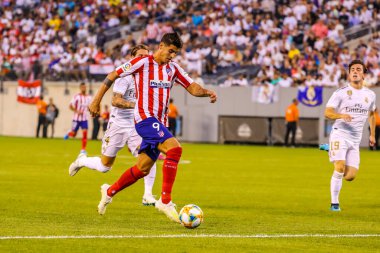EAST RUTHERFORD, NJ - JULY 26, 2019: Alvaro Morata of Atletico de Madrid #9 in action during match against Real Madrid in the 2019 International Champions Cup at MetLife stadium. Real Madrid lost 3-7 clipart
