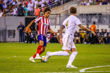 Doğu RUTHERFORD, NJ - 26 Temmuz 2019: Atletico de Madrid 'den Joao Felix MetLife Stadyumu' nda oynanan 2019 Uluslararası Şampiyonlar Kupası 'nda Real Madrid' e karşı maç yapıyor. Real Madrid 3-7 yenildi