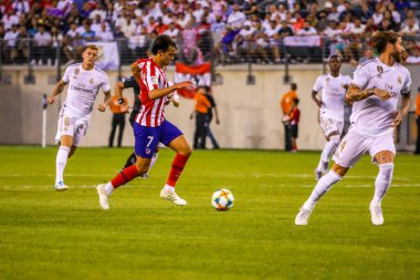 Doğu RUTHERFORD, NJ - 26 Temmuz 2019: Atletico de Madrid 'den Joao Felix MetLife Stadyumu' nda oynanan 2019 Uluslararası Şampiyonlar Kupası 'nda Real Madrid' e karşı maç yapıyor. Real Madrid 3-7 yenildi
