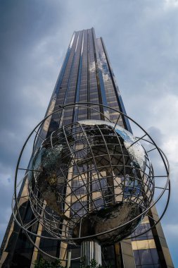 NEW YORK - JULY 21, 2022: Globe in the front of Trump International Hotel and Tower at Columbus Circle, Manhattan, New York