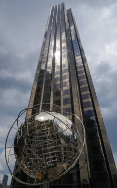 NEW YORK - JULY 21, 2022: Globe in the front of Trump International Hotel and Tower at Columbus Circle, Manhattan, New York