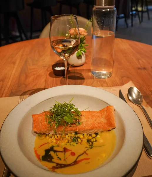 Corn Nut Crusted Salmon served in gourmet restaurant