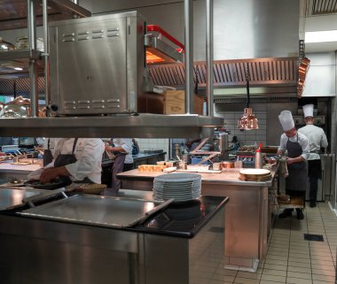 REIMS, FRANCE - MAY 26, 2022: Kitchen at the Two Star Michelin and Relais Chateaux award-winning Restaurant Le Parc at the Domaine Les Crayeres, a classic French hotel in Reims