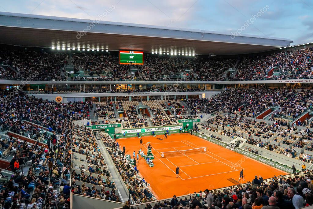 PARIS, FRANCE - MAY 30, 2022: Court Philippe Chatrier at Le Stade Roland Garros during round 4 night match at 2022 Roland Garros in Paris, France