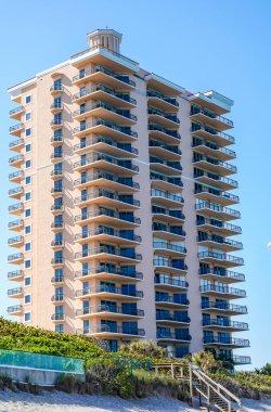 RIVIERA BEACH, FLORIDA - MARCH 29, 2022: Luxury condominiums at Singer Island, Fl. Singer Island an oceanfront neighborhood part of the city of Riviera Beach with natural beaches and upscale hotels