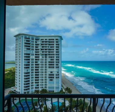 RIVIERA BEACH, FLORIDA - FEBRUARY 17, 2022: Luxury condominiums at Singer Island, Fl. Singer Island an oceanfront neighborhood part of the city of Riviera Beach with natural beaches and upscale hotels