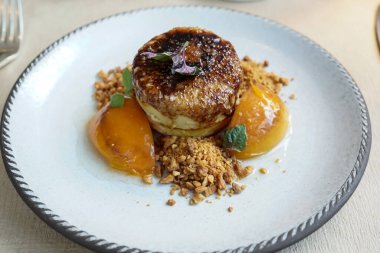 Foie Gras Terrine Brulee with Glazed Apricots and Almonds 