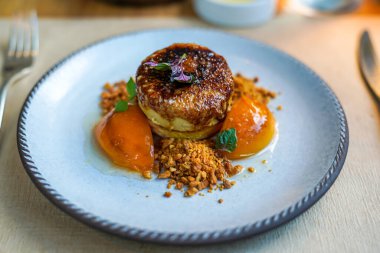 Foie Gras Terrine Brulee with Glazed Apricots and Almonds 