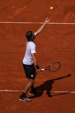PARIS, FRANCE - MAY 30, 2022: Professional tennis player Stefanos Tsitsipas of Greece in action during his round 4 match against Holger Rune of Denmark at 2022 Roland Garros in Paris, France