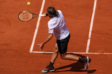 PARIS, FRANCE - MAY 30, 2022: Professional tennis player Stefanos Tsitsipas of Greece in action during his round 4 match against Holger Rune of Denmark at 2022 Roland Garros in Paris, France