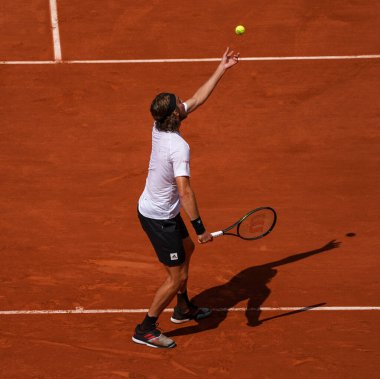 PARIS, FRANCE - MAY 30, 2022: Professional tennis player Stefanos Tsitsipas of Greece in action during his round 4 match against Holger Rune of Denmark at 2022 Roland Garros in Paris, France