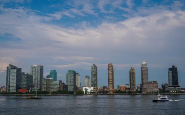 Long Island City (Queens) skyline. Long Island City (L.I.C.) is the westernmost residential and commercial neighborhood of the New York City borough of Queens