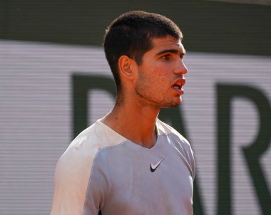 PARIS, FRANCE - MAY 31, 2022: Professional tennis player Carlos Alcaraz of Spain in action during his quarter-final match against Alexander Zverev of Germany at 2022 Roland Garros in Paris, France