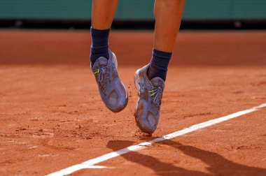 PARIS, FRANCE - MAY 31, 2022: Professional tennis player Carlos Alcaraz of Spain wears Nike tennis shoes during his quarter-final match against Alexander Zverev at 2022 Roland Garros in Paris, France