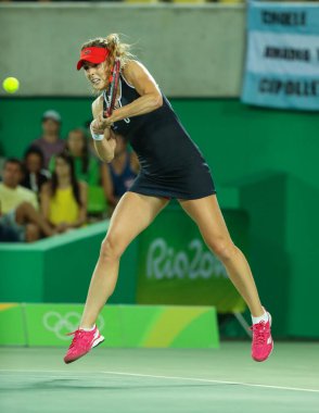 RIO DE JANEIRO, BRAZIL - AUGUST 8, 2016: Professional tennis player Alize Cornet of France in action during women's singles round 2 match of the Rio 2016 Olympic Games at the Olympic Tennis Centre