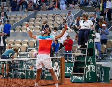 PARIS, FRANCE - JUNE 1, 2022: Grand Slam Champion Marin Cilic of Croatia celebrates victory after his quarter-final match against  Andrey Rublev of Russia at 2022 Roland Garros in Paris, France
