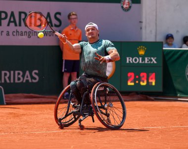 PARIS, FRANCE - JUNE 5, 2022: Argentinian wheelchair tennis player Gustavo Fernandez in action during his wheelchair men's singles final match against Shingo Kunieda at 2022 Roland Garros in Paris, France