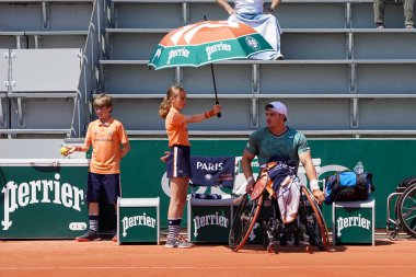 PARIS, FRANCE - JUNE 5, 2022: Argentinian wheelchair tennis player Gustavo Fernandez in action during his wheelchair men's singles final match against Shingo Kunieda at 2022 Roland Garros in Paris, France