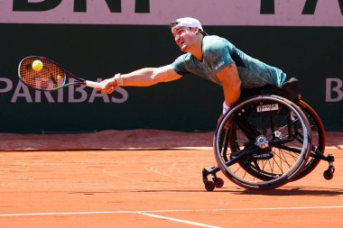 PARIS, FRANCE - JUNE 5, 2022: Argentinian wheelchair tennis player Gustavo Fernandez in action during his wheelchair men's singles final match against Shingo Kunieda at 2022 Roland Garros in Paris, France