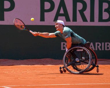 PARIS, FRANCE - JUNE 5, 2022: Argentinian wheelchair tennis player Gustavo Fernandez in action during his wheelchair men's singles final match against Shingo Kunieda at 2022 Roland Garros in Paris, France
