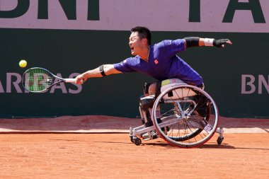 PARIS, FRANCE - JUNE 5, 2022: Wheelchair tennis player Shingo Kunieda of Japan in action during his wheelchair men's singles final match against Gustavo Fernandez of Argentina at 2022 Roland Garros in Paris, France