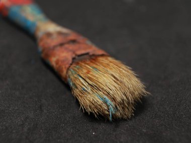 brush paint used condition with dirty brush and rusted brush holder