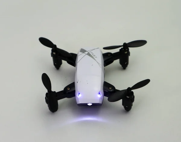 gray drone in photo studio in white background