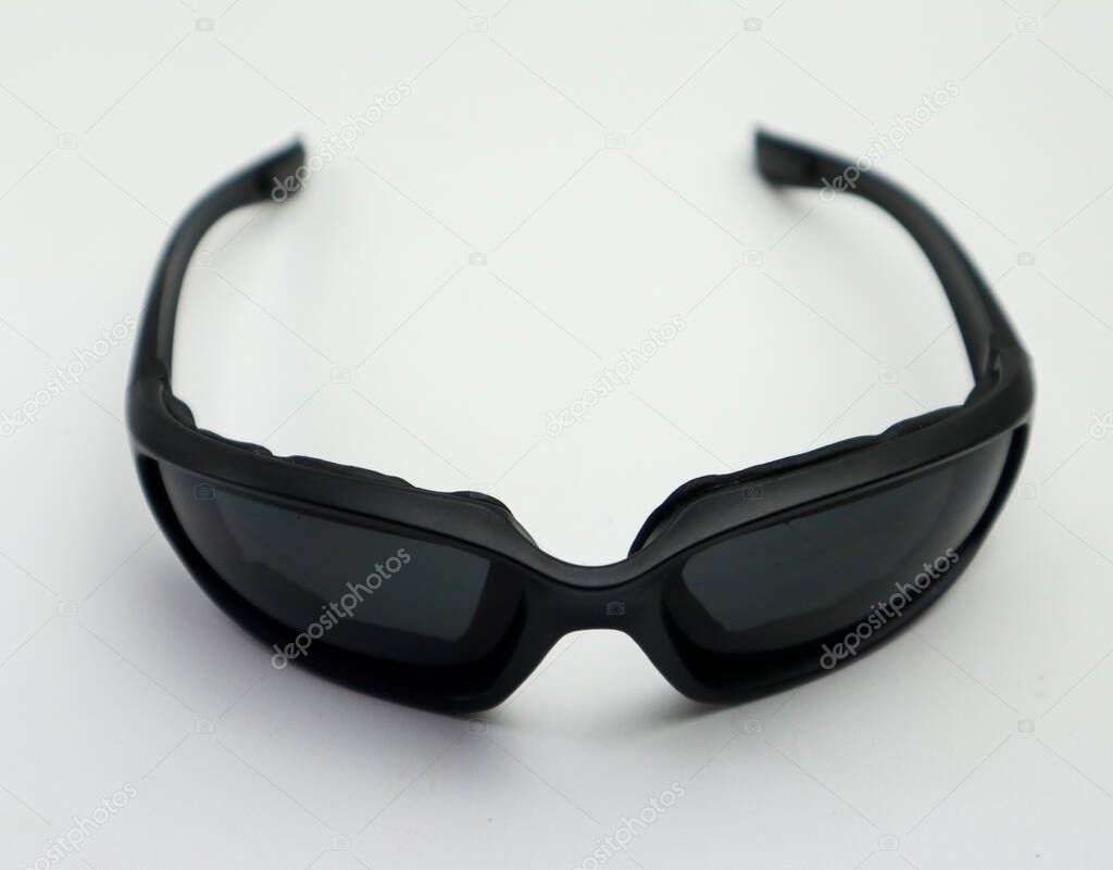 black sport sunglasses isolated white background selective focus