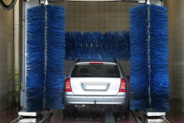 car in a washing plant