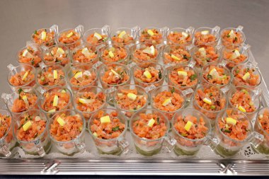 Salmon tartare with avocado puree and horseradish puree