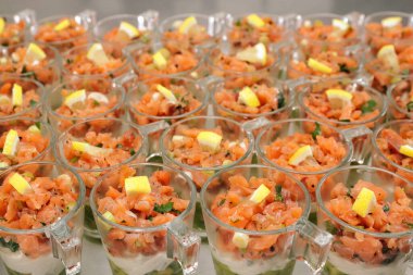 Salmon tartare with avocado puree and horseradish puree