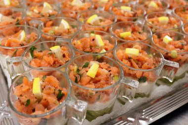 Salmon tartare with avocado puree and horseradish puree