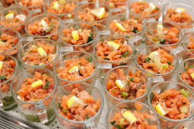 Salmon tartare with avocado puree and horseradish puree