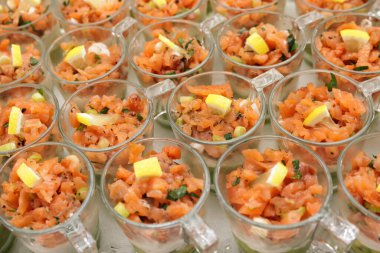 Salmon tartare with avocado puree and horseradish puree