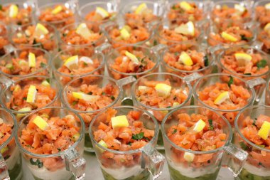 Salmon tartare with avocado puree and horseradish puree