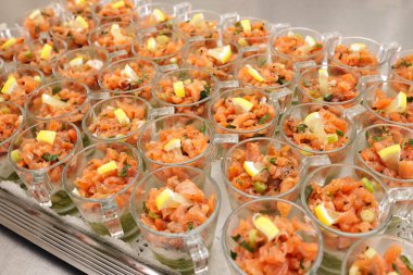 Salmon tartare with avocado puree and horseradish puree