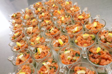 Salmon tartare with avocado puree and horseradish puree