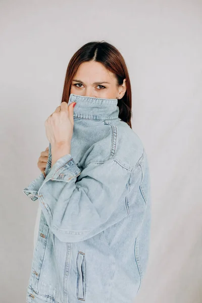 Denim Jacket Female Woman Covering Her Face Colla — 스톡 사진