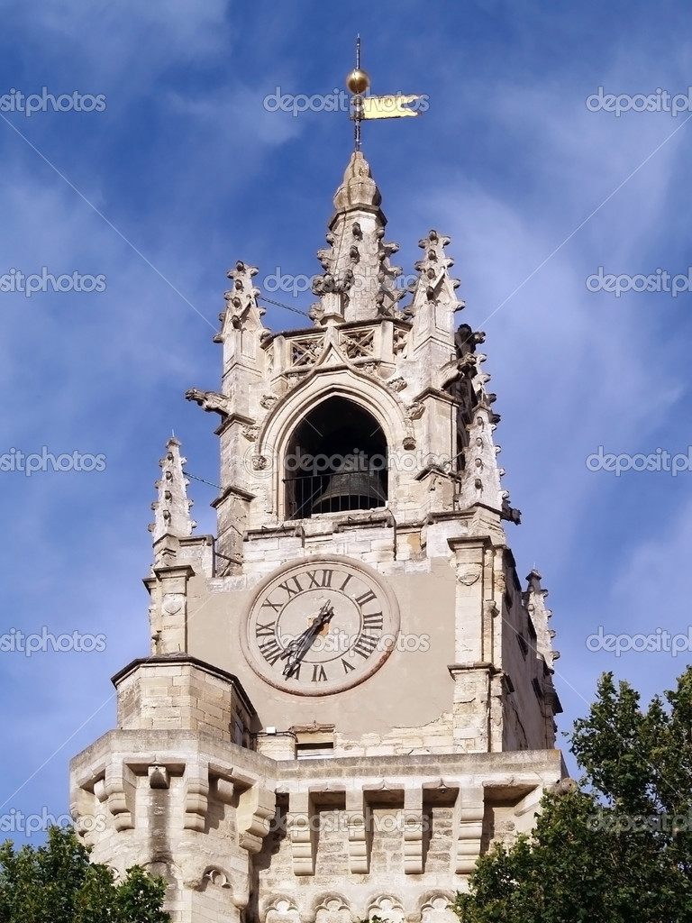 Clock tower in Avignon, France (Horloge) Stock Editorial Photo