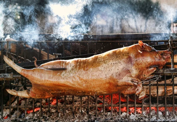 Roasting piglet — Stock Photo, Image