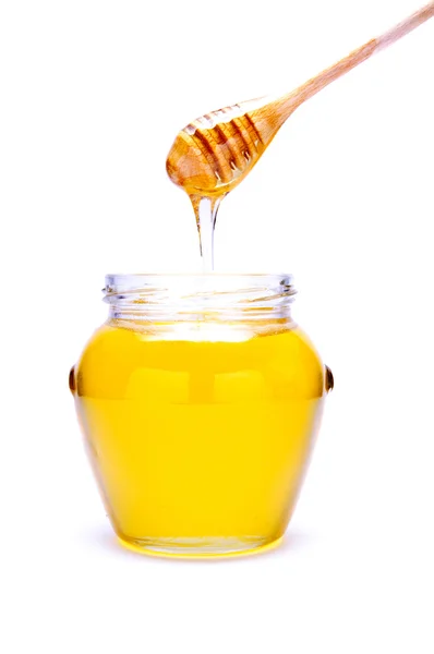 Verter miel — Foto de Stock