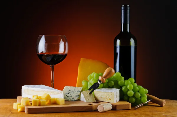 Wine, grapes and cheese — Stock Photo, Image