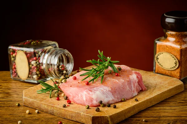 Raw pork meat and spices — Stock Photo, Image