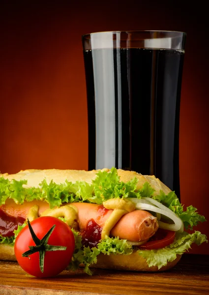 Hot dog and cola drink — Stock Photo, Image