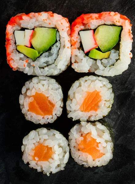 Maki and uramaki sushi rolls — Stock Photo, Image