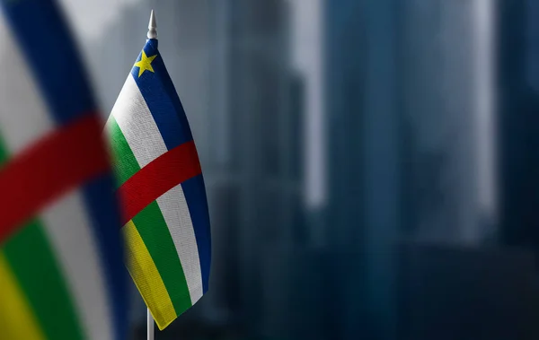 Small flags of Central African Republic on a blurry background of the city — Stock Photo, Image
