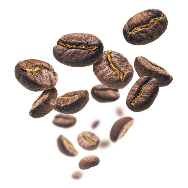 Οι κόκκοι καφέ αιωρούνται σε λευκό φόντο — Φωτογραφία Αρχείου