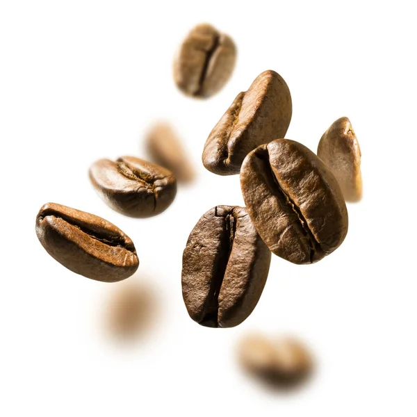 Coffee beans levitate on a white background — Stock Photo, Image