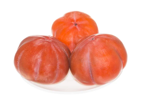 Persimmon pada latar belakang putih — Stok Foto